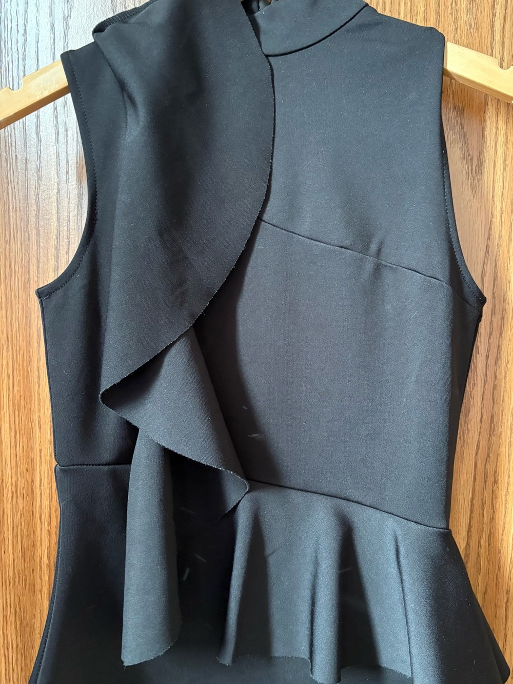 Asymmetrical Black Ruffle Peplum Top - Picture 4 of 9